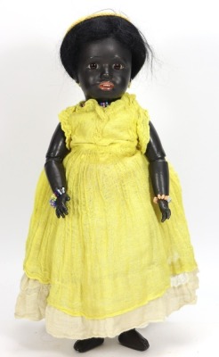A boxed Simon & Halbig 1358 black bisque head character doll, size 7, German circa 1900,