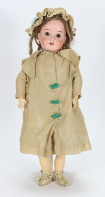 A Schoenau & Hoffmeister 1909 bisque head doll, German circa 1915,