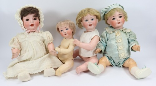 Four German bisque head baby dolls,
