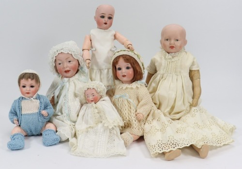 Six various bisque head doll,