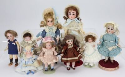 A group of nine various small and miniature German dolls,