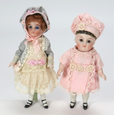 A miniature German all bisque doll,