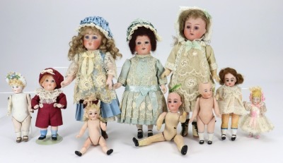 A group of ten various small and miniature German dolls,
