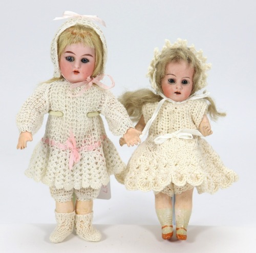 A miniature K&R bisque head doll,