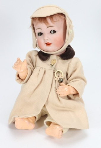 A Konigs Wernicke bisque head baby doll,
