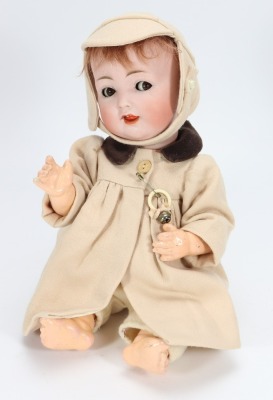 A Konigs Wernicke bisque head baby doll,