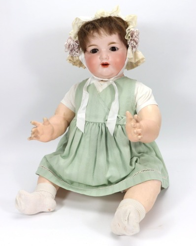 A large A.M 990 bisque head baby doll,