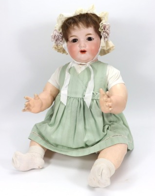 A large A.M 990 bisque head baby doll,