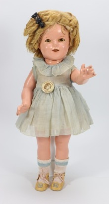 A Shirley Temple composition doll by ideal, American 1935-40