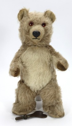 A post-war musical Chiltern Bruin Teddy bear with rare mechanical head movement,