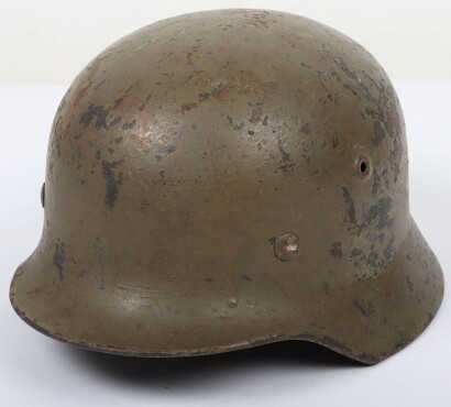 WW2 German M40 Steel Combat Helmet, Green Camouflage Overpaint.