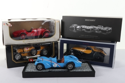 Four Boxed 1:18 Scale Models