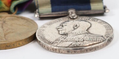First World War British naval medal group of Four, comprising of 1914-15 star, British War Medal, British Victory medal and GRV Naval Long Service Good Conduct medal (impressed H.M.S. Emperor of India) with fixed suspension. Impressed to K-15652 Stoker 1s - 6