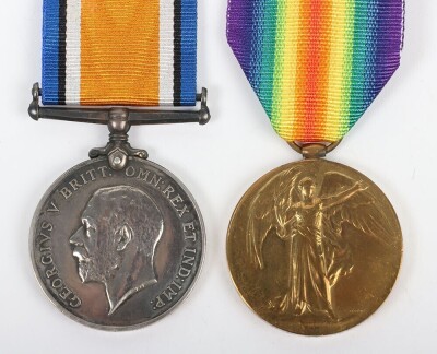 First World war Medal Pair comprising of British War Medal and British Victory medal impressed to 24990 Pte. Herbert Edward . St. John, Hampshire Regiment. (2) St John also served in the Dorset Regiment with the service number 46429 - 4
