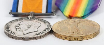 First World war Medal Pair comprising of British War Medal and British Victory medal impressed to 24990 Pte. Herbert Edward . St. John, Hampshire Regiment. (2) St John also served in the Dorset Regiment with the service number 46429 - 6