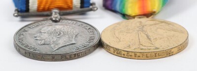 First World War British Medal Pair to the Royal Hampshire Regiment. Comprising of British War medal and Victory medal. Impressed to 21739 Pte, Alfred William Fletcher, The Royal Hampshire Regiment together with Silver Wound Badge No.434222.Wounded 29th Oc - 3