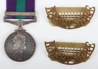 ERII General Service Medal to the Royal Hampshire Regiment with Malaya Clasp. Impressed to 23140064 Pte. R.A Hampton Royal Hampshire Regiment with its original box and pair of Royal Hampshire brass shoulder titles. (3) - 2