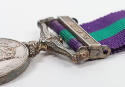 ERII General Service Medal to the Royal Hampshire Regiment with Malaya Clasp. Impressed to 23140064 Pte. R.A Hampton Royal Hampshire Regiment with its original box and pair of Royal Hampshire brass shoulder titles. (3) - 6
