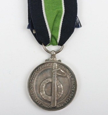 EIIR Colonial Police Forces Long Service and Good Conduct Medal to an African Detective in the British South Africa Police. - 2
