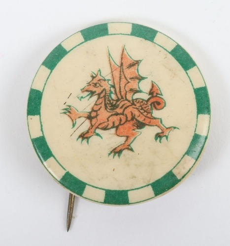 WW1 Kitchener's Army metal pin back badge to the 38th Welsh Division.