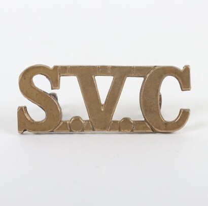 The Singapore Volunteer Corps gilding Metal shoulder Title.