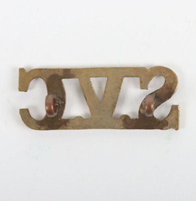 The Singapore Volunteer Corps gilding Metal shoulder Title. - 2