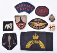 Grouping of Cloth Insignia and Badges