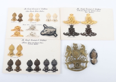 Grouping of Cap Badges & Collars in cloth metal & Anodised to the Royal Regiment of Artillery.
