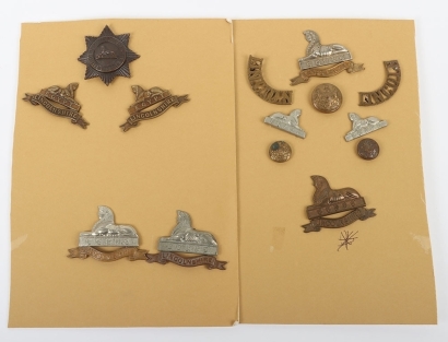 A set of Military Cap, Collar Badges Shoulder Titles & Buttons to the Lincolnshire Regiment