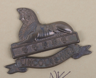 A set of Military Cap, Collar Badges Shoulder Titles & Buttons to the Lincolnshire Regiment - 3