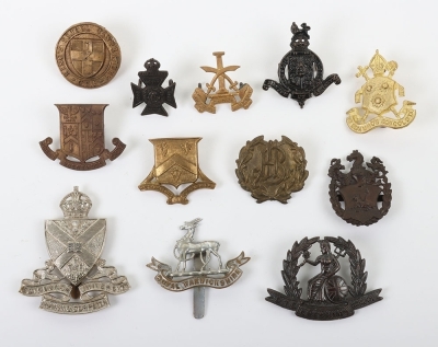Selection of O.T.C & C.CF Cap Badges.