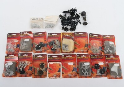 Fourteen packets of Silent Death miniatures models in packets.