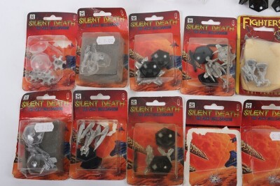 Fourteen packets of Silent Death miniatures models in packets. - 2