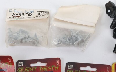 Fourteen packets of Silent Death miniatures models in packets. - 5