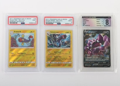 Three Graded Pok&eacute;mon Trading Cards.