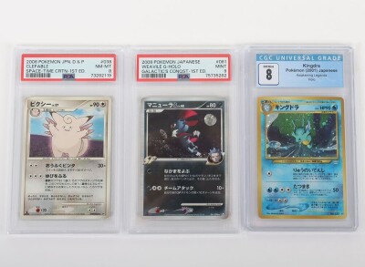 Three Graded Pok&eacute;mon Trading Cards Japanese.