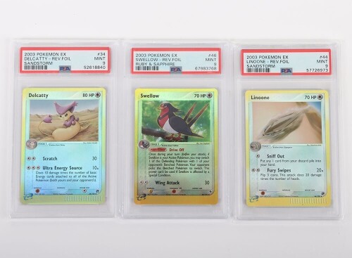 Three Graded PSA Pok&eacute;mon Trading Cards.