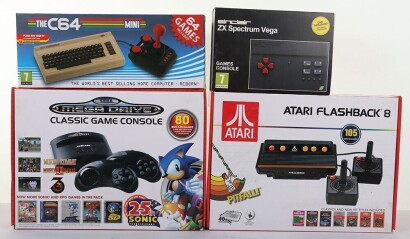 Four Retro Modern Games Consoles boxed.
