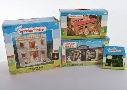 Collection of Vintage Sylvanian Families Boxed playsets and figures.