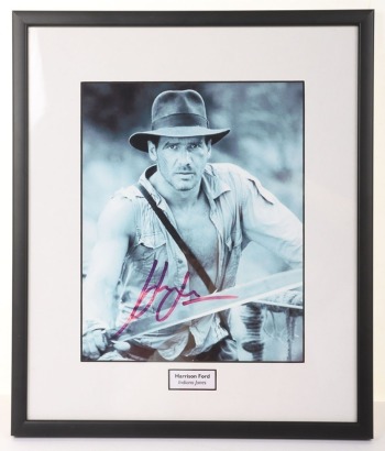 Scarce Harrison Ford signed autograph Indiana Jones Photograph with certificate of Authenticity.