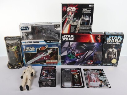 Collection of Modern Star Wars Action Figures and Toys.