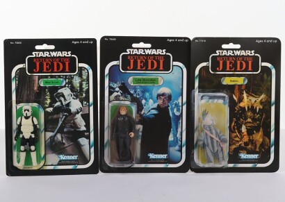 Three Vintage Star Wars Action Figures Kenner. All with reproduction card backs and bubbles.