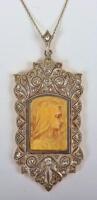 A Continental 18ct gold and diamond religious pendant