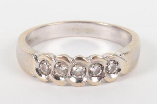 An 18ct white gold and five stone diamond ring