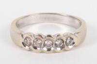 An 18ct white gold and five stone diamond ring