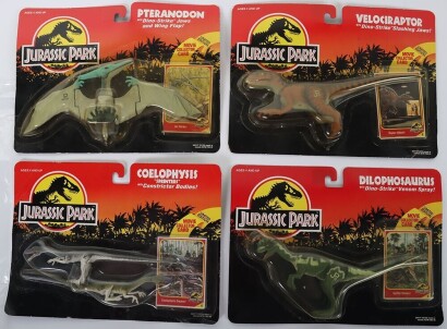 Four Vintage Jurassic Park Dinosaurs in original packaging Kenner 1993.