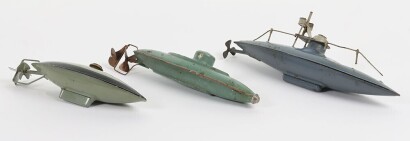 Three German tinplate clockwork Submarines,