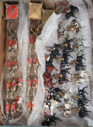 Britains Coronation coaches, attendants and troops,