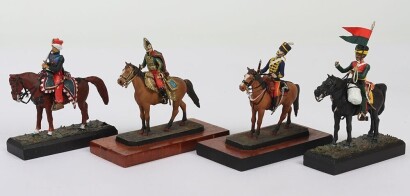 Four lead painted mounted 19th century Military figures,