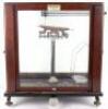 A Townson & Mercer set of scales, in glass, oak and mahogany case